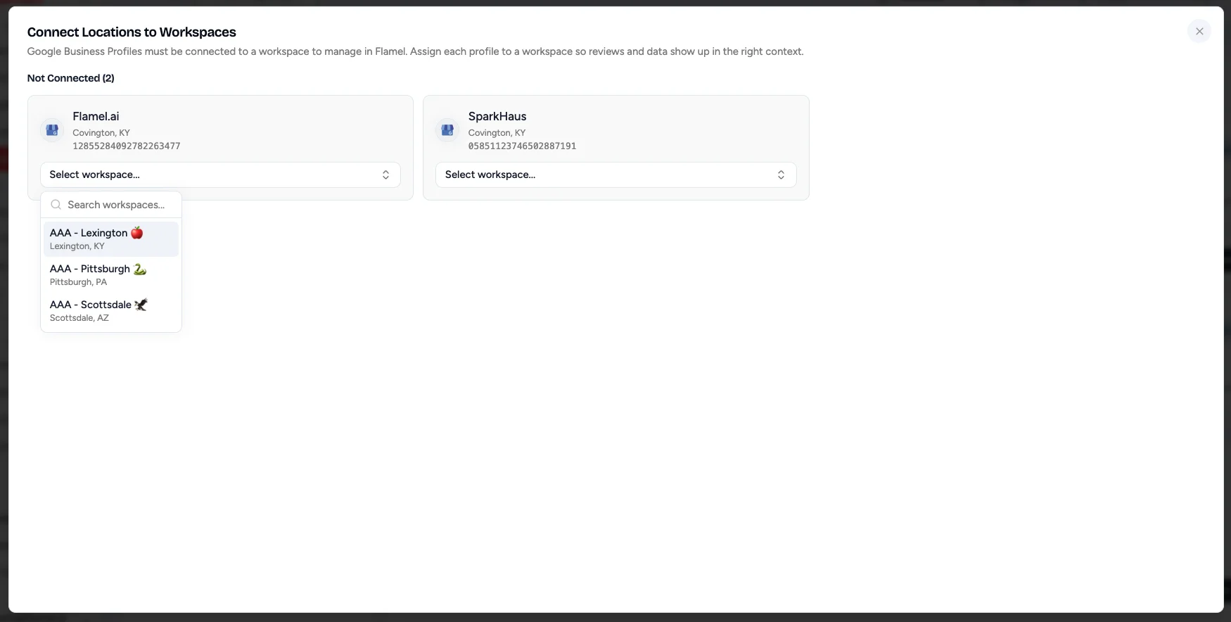 Connect Locations to Workspaces dialog with a workspace dropdown for each Google Business Profile
